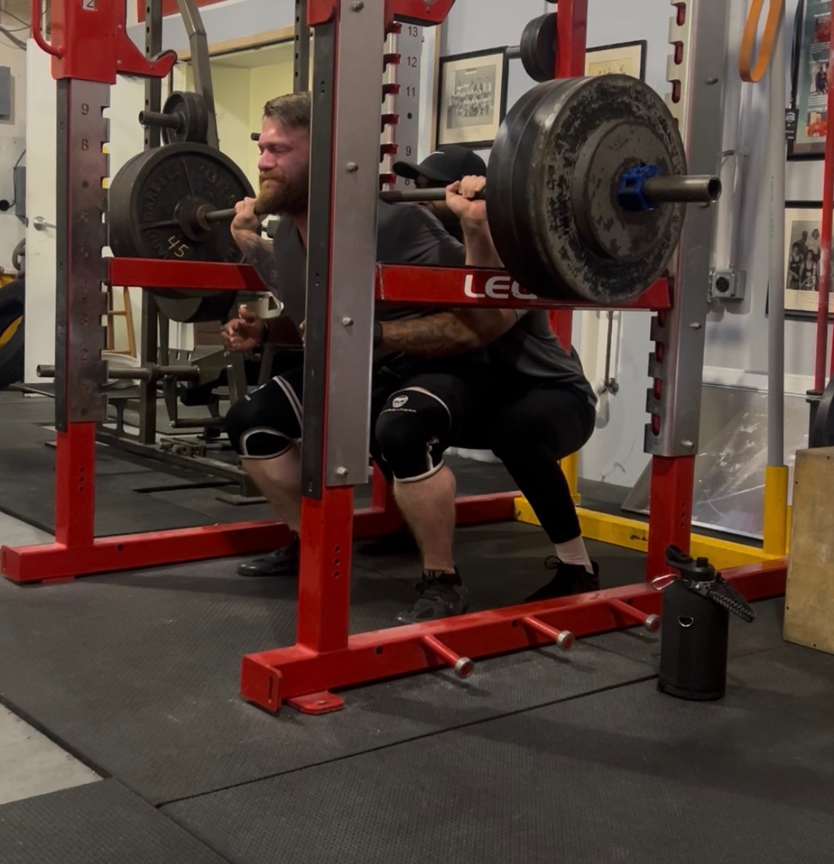 Client working through a heavy back squat